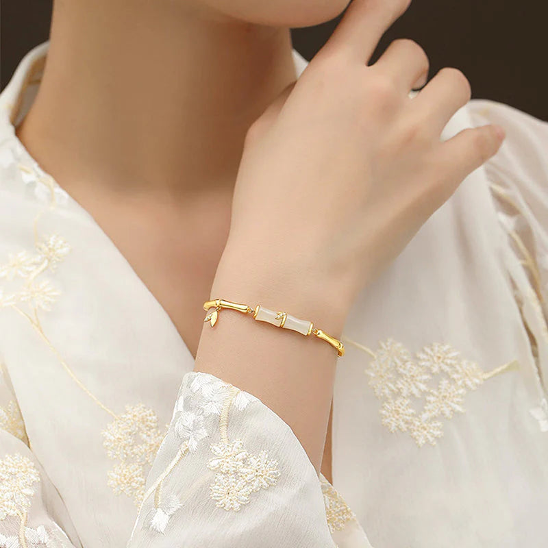 Női bambusz karkötő lánccal